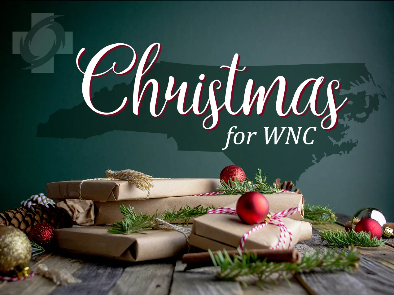 presents, ornaments, and greenery with North Carolina map in background and words Christmas for WNC